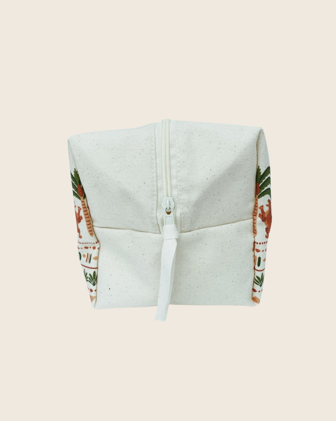 Opening of tiger print toiletry bag and cotton puller.