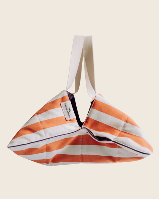 Orange and white striped cake carrier bag