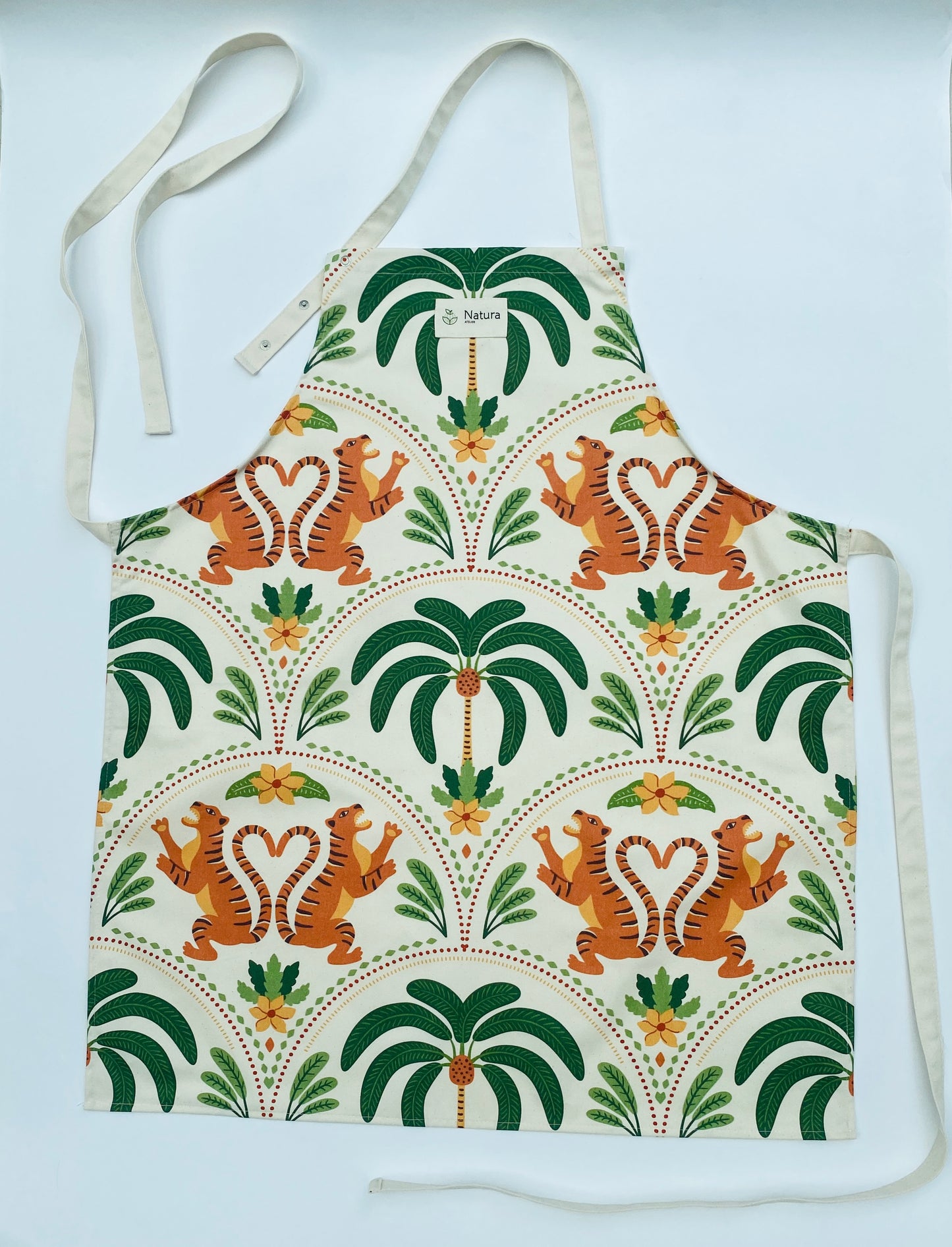 Apron with tiger and palm tree pattern on a white background