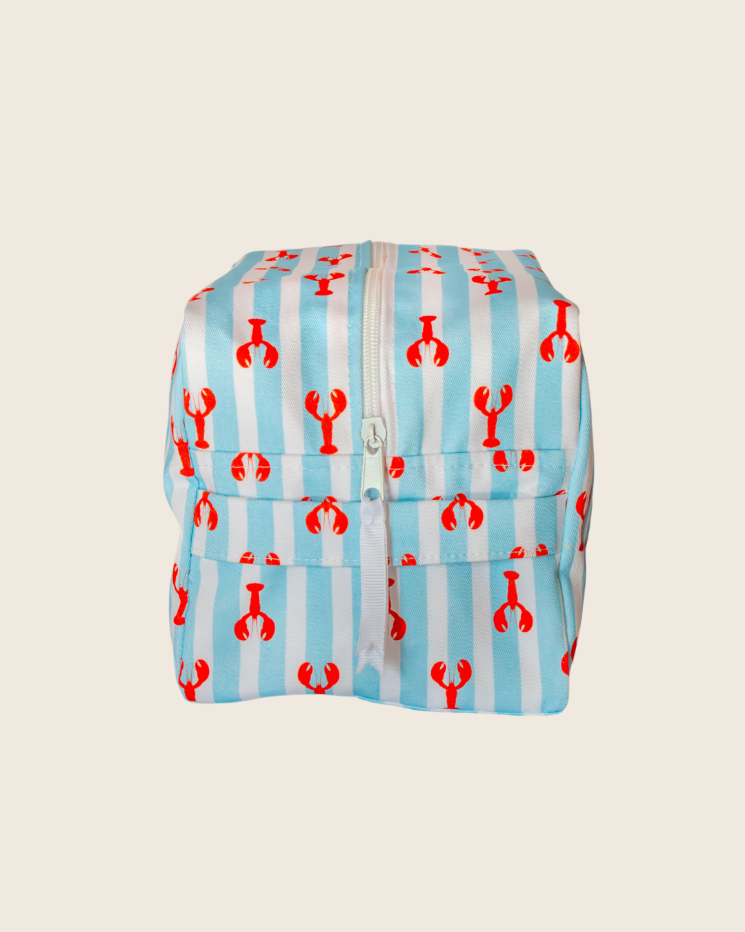 Cube-shaped pouch with red lobster pattern on a light blue background