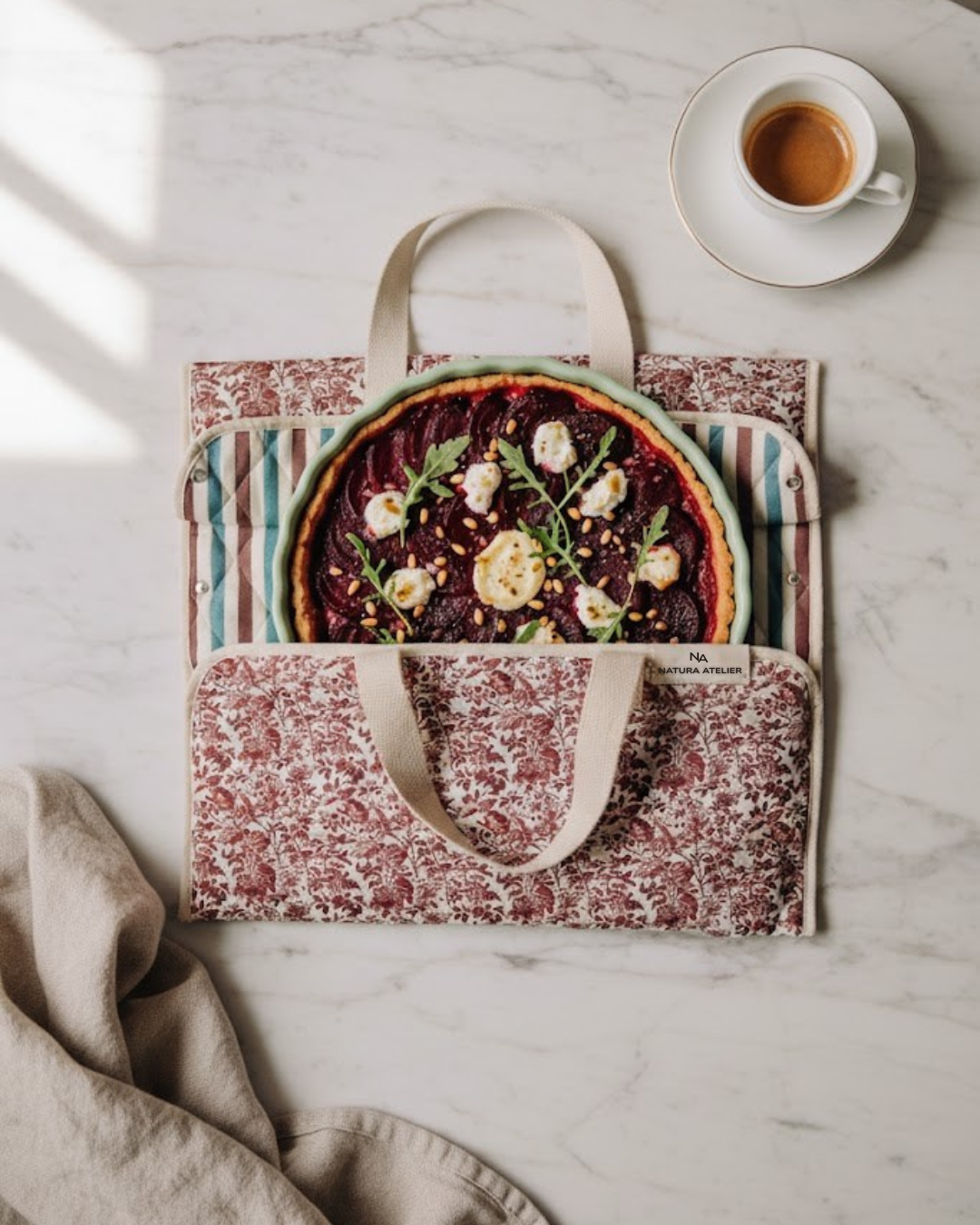 Toile de Jouy tart carrier bag with beetroot tart inside 