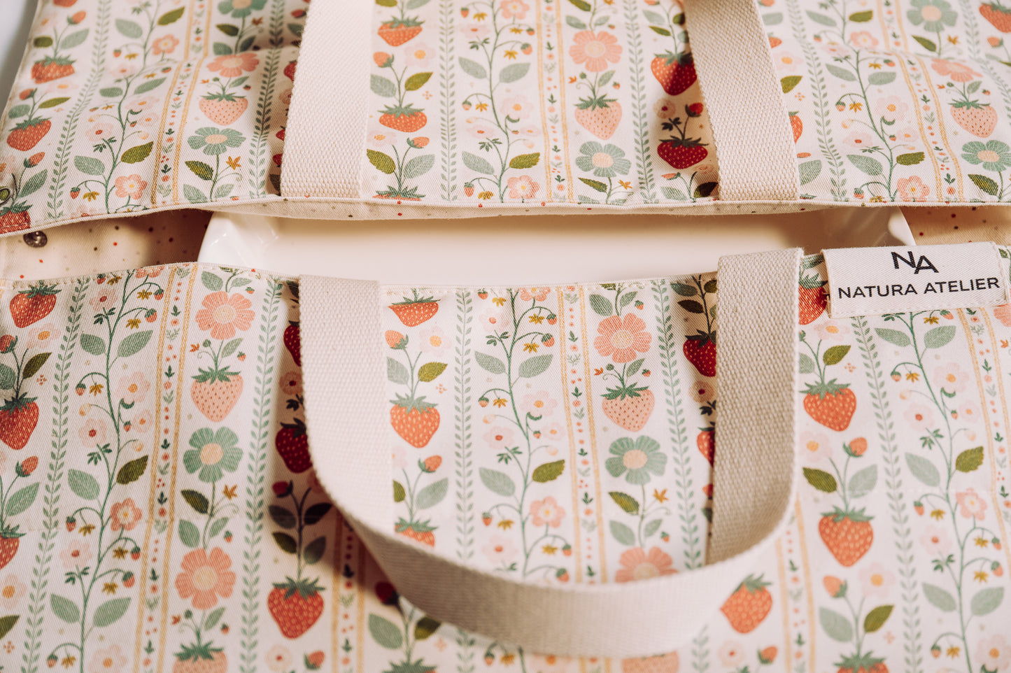Vintage Strawberries Cake Carrier Bag pattern close up with cotton brand label