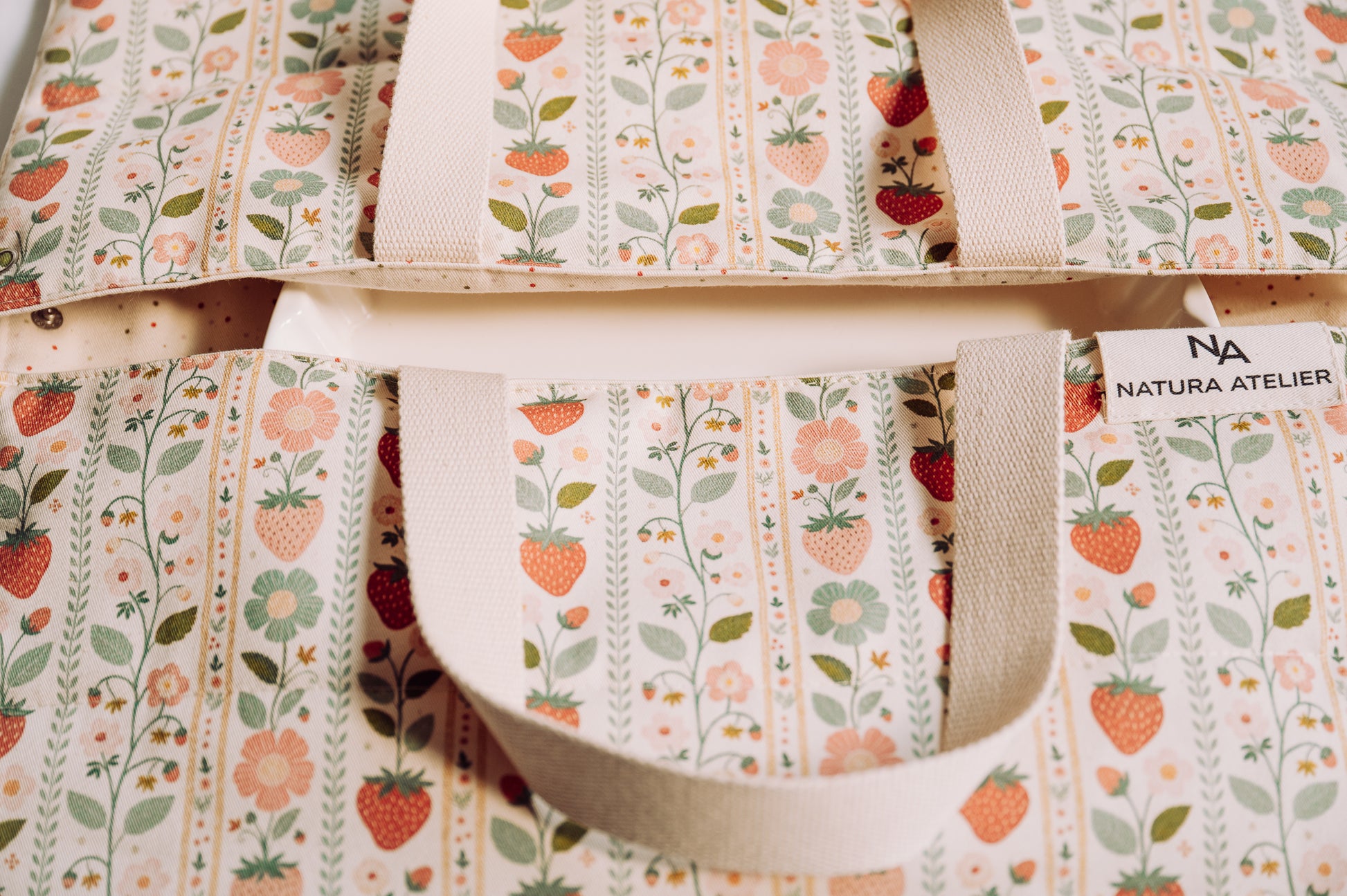 Vintage Strawberries Cake Carrier Bag pattern close up with cotton brand label